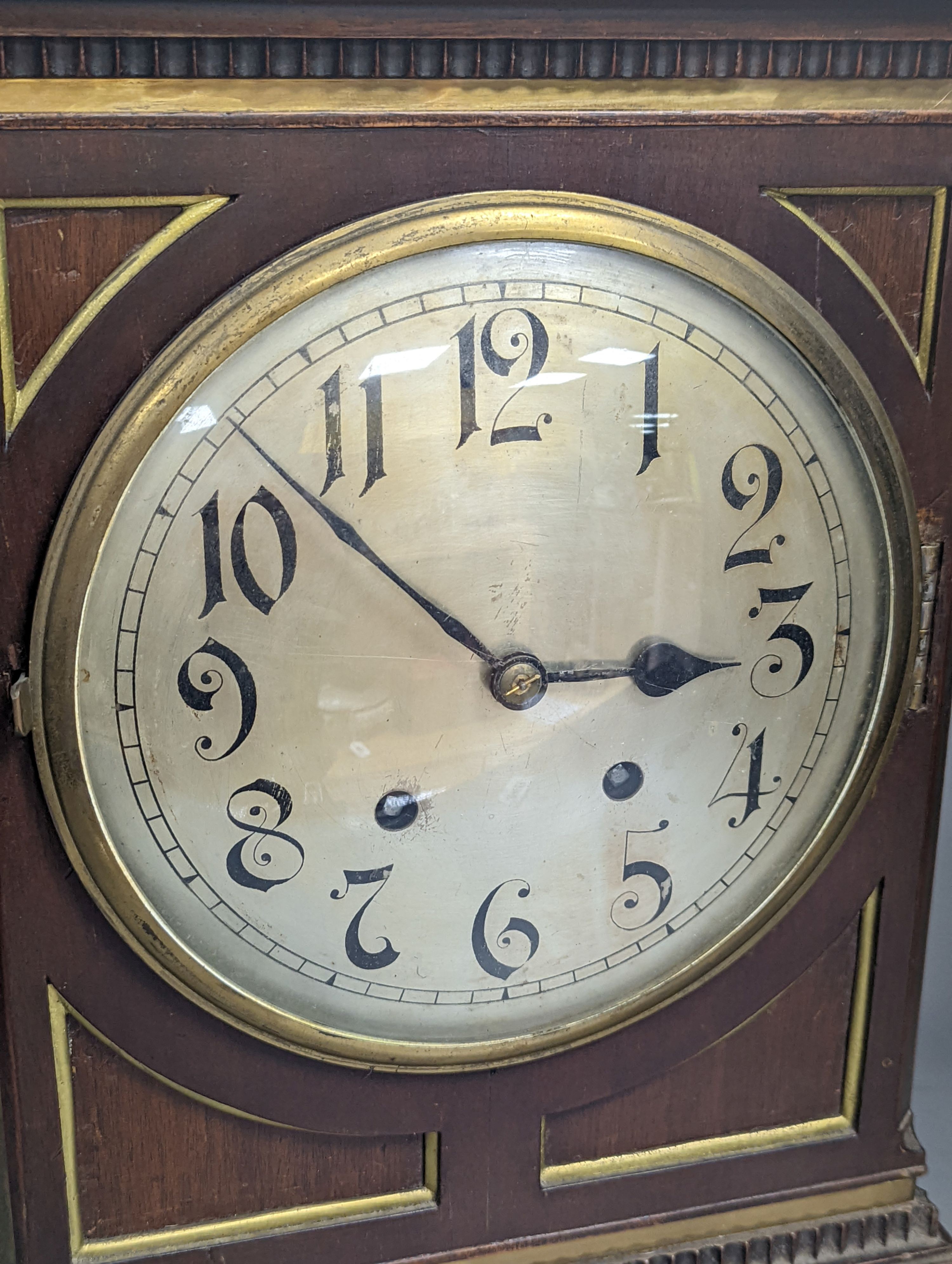 A late 19th century German mahogany and brass mounted mantel clock, 50cm high